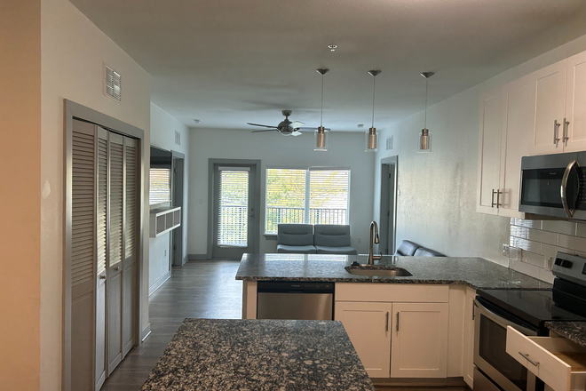 Kitchen + Common Area - (FIRST MONTH PAID) College Park at Midtown | The Edge Apartments