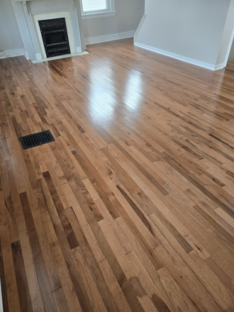 Newly installed hardwood floors in living room - Huge 3 Bedroom apartment Now Pre-Leasing for 2027 Academic Year! Available August 2027
