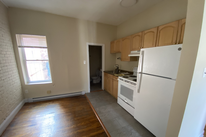 LIVING - AWESOME PRICE! 2 BED WITH HOT WATER INCLUDED! 9/1/25! Apartments