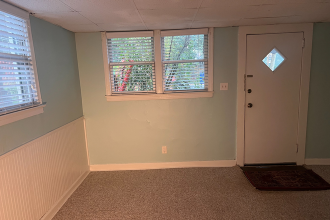 Living room and front entry - Great two bedroom apartment, electric, gas, water and trash included at ideal Decatur location.