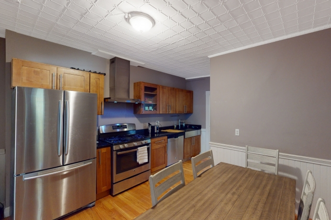 Kitchen - Renovated 3 Bedroom in Porter Square Apartments