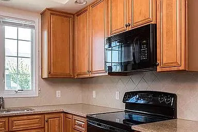 Kitchen - Very close to JMU - 3 bedroom house with a very small backyard and a patio
