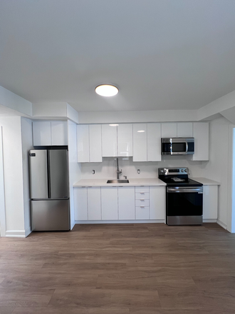 Kitchen - ONLY BED#2 LEFT - Fully renovated 4-bedroom apartment at Bloor & Bathurst