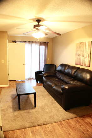 Living Room - Now Pre-Leasing for the 2026–2027 School Year! Townhome