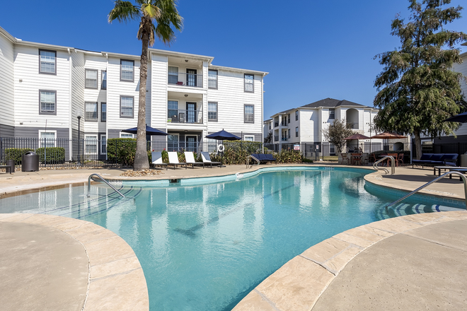 Community pool in the center of the property - Crossing Place Student Living Apartments