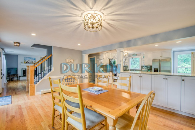 dining - Eastward Look Contemporary Home with Open Living Spaces, Deck, and Patio Areas