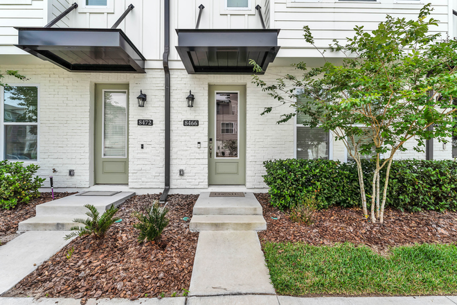 Outside Street View - FULLY FURNISHED! Stylish Townhome with High-Quality Vinyl Flooring