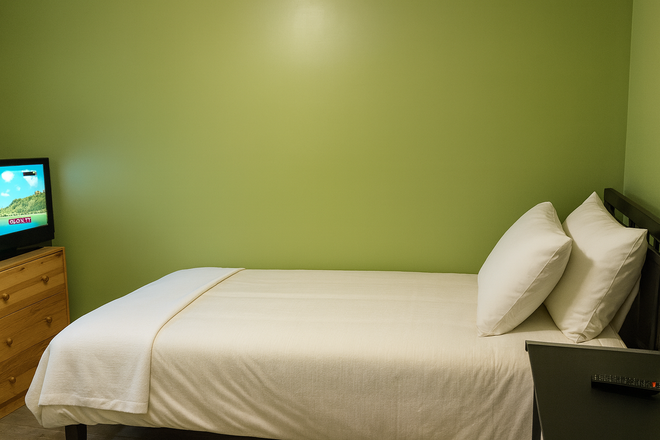 Bedroom B: $650 with Single sized bed - Private rooms for female in a shared basement at Victoria Park Avenue! Utilities included! House