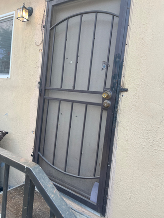 Apt home front door and Security Door - Legal Updated 2 bedroom/1 bath Apt Home with Washer/Dryer  in Unit & ADT Security System