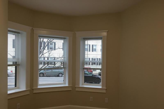 Visit hubrealtyproperties.com - Prime location, renovated 4 bedroom 2 bathroom with dishwasher, on green line T Apartments