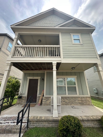 Outside of the single standing Cottage - Female Bedroom in Redpoint 4x4 Cottage near campus with accessible bus routes TAMU and Blinn. Apartments