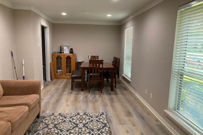 One of the living rooms - Off-campus housing in Garland/Large, lovely, and upgraded home/with lots amenities.