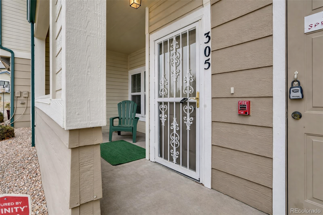 Outside of Unit - Separate Entrance and Private Porch - Updated 2BR1/BA Condo South of Lowry | Gated Community