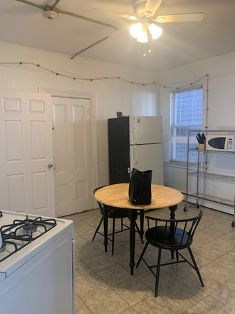 kitchen - Sunny, spacious 3 bed, partially furnished, Available June 1 Apartments