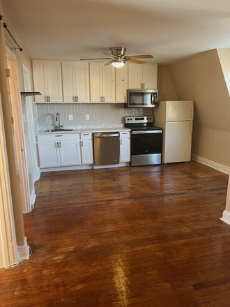 Main room into kitchen - Studio Gem in Charles Village - Quiet Building Apartments