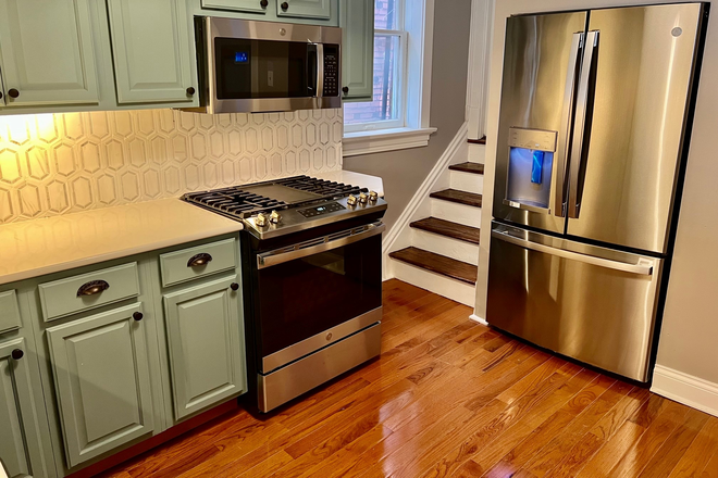 Kitchen with all new Stainless Appliances Included - Fully Renovated 4 bd Home Near Wash U and Forest Park