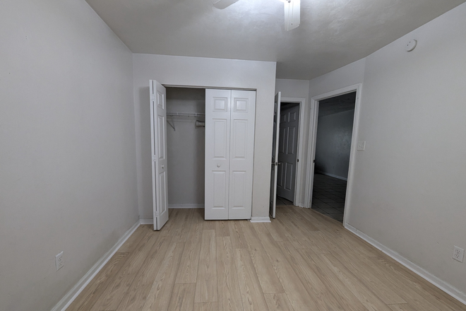 Downstairs bedroom with attached bathroom access - 1340 Hancock Triplex