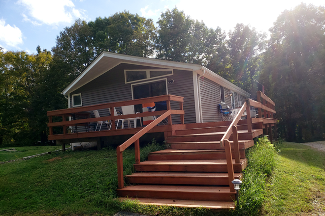 Rear Unit deck and parking area - Maple Road Duplex Rental