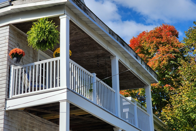 Back porch of home - .FURNSHD BEDROOM, $1550 , 6/7 min to BC shuttle/MBTA trains/Longwood Med.