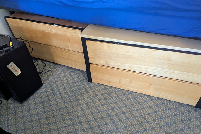 Underneath the bed there are 4 sliding drawers for storage. - Vista Del Campo Norte Apartment