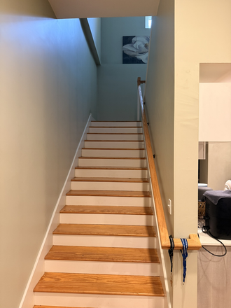 stair case to the 2 rooms upstairs - 3 bed 2 and half bath