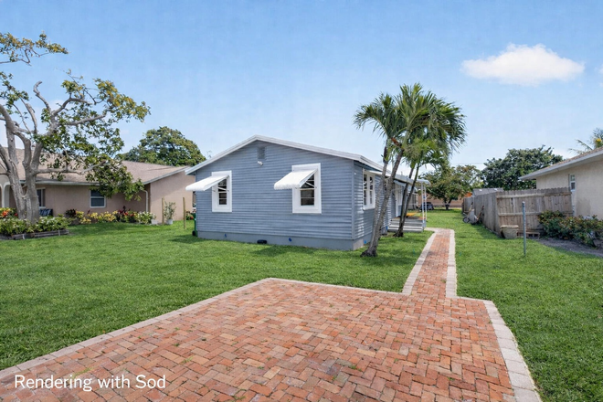 front of house - Cottage  9 min to Campus. 1.5 blocks to Atlantic ave Downtown. 1.5 miles from Beach House