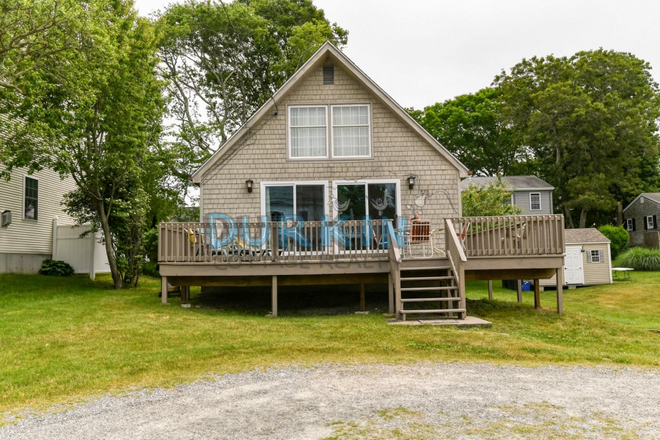 front - Spacious living area with deck in Narragansett House