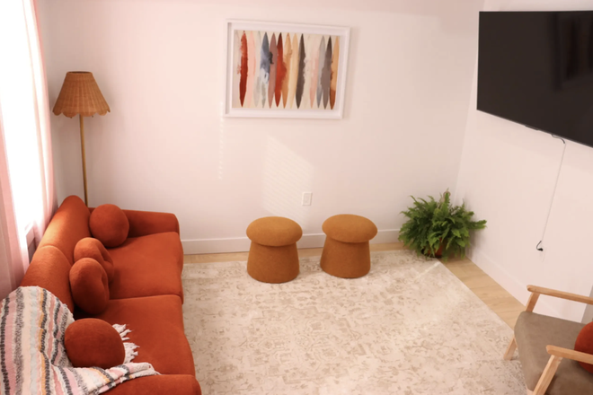 Living room - Modern 4BR/2BA Duplex w/ Deck & Backyard Access fully furnished– $1600/Room – All-Inclusive!