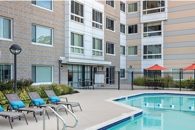 Picture of the apartment with pool.  See website for apartment pictures. - Roomshare in 2BR - Peninsula Apartments - 3 roommates total (includes YOU!)