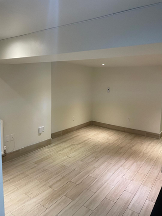 Living Room/ Dining Room - Spotless, clean 2 bedroom basement apartment - great neighbourhood - On subway route