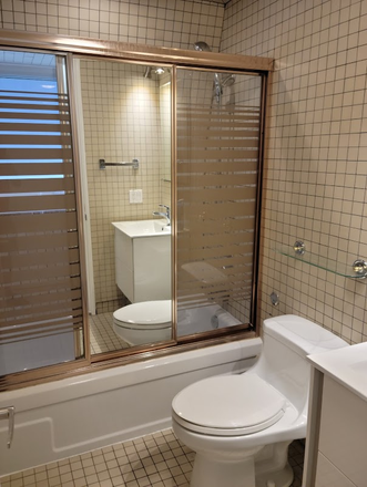 main floor bath - Bright open concept upper duplex in historical Victorian home