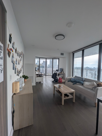 Living Room - Bedroom in a 2+1 Bedroom 2 Bathroom Condo on Yonge and Wellesley