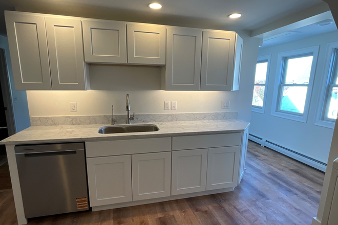 Newly-remodeled kitchen. - Full Top Floor 3 Bedroom Unit—Newly Remodeled Triplex
