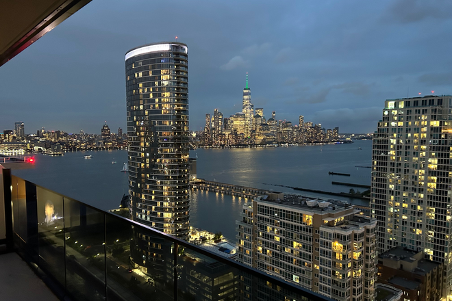 Beautiful south looking view from 27F at dusk. - Bisby at Newport (27th Floor)