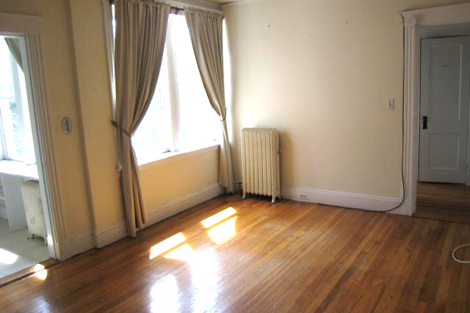 Visit hubrealtyproperties.com - Large studio next to 66 bus, in Allston Apartments