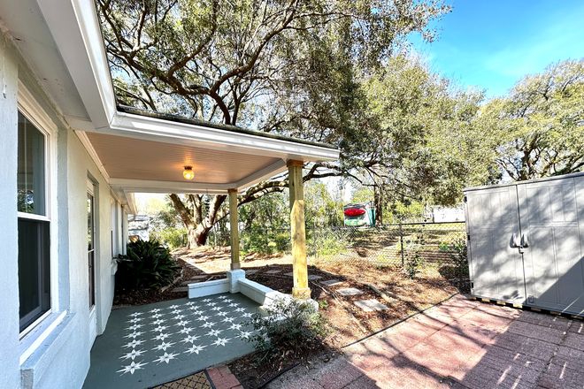 Front door behind privacy fence and gate - Quiet Cottage on 1 acre along West Ashley Greenway House