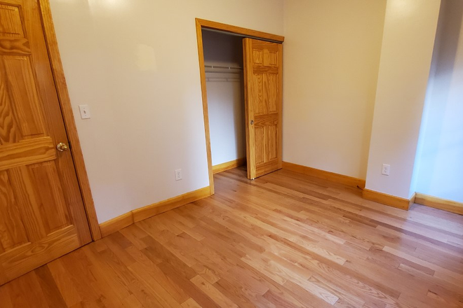 master bdrm - empty - 3bdrm avail. Aug 1, Brookline Village Apartments