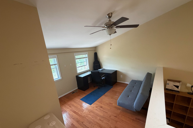 3rd floor office area - includes futon, chair, desks - Furnished rowhome within 10 minutes of JHU Medical Campus, rent includes utilities