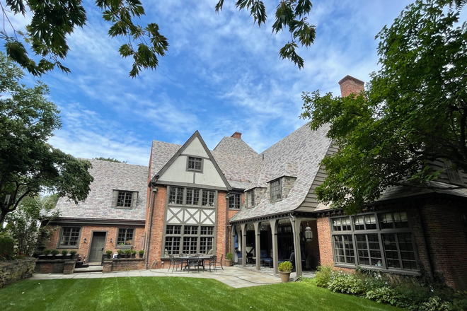 View of the house from the backyard - Private bedroom in suite in stately West End home w/ bath, dedicated kitchen, exercise rm