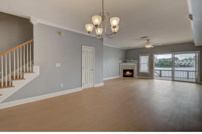 Living room (furnished) - Townhome near shopping centers!