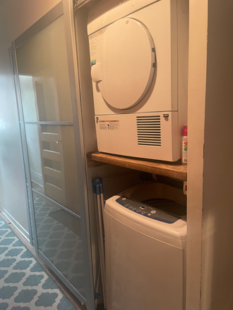 Laundry. - Furnished bedroom in house in Riverdale.