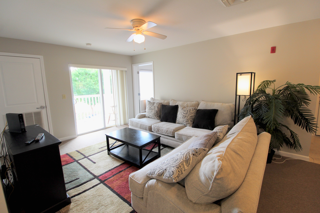 Living area - Campus View - 4 bedroom 4 bath - top floor condo for rent!