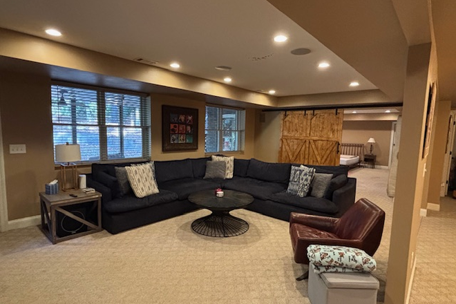 Well appointed living room w/ seating for 8+ - Stunning 1,800 sq. ft. 1-bd/1 bath, Walkout Apartment - Fully Furnished, All Utilities Included