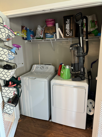 Washer and dryer right off the kitchen - Standard Apartments