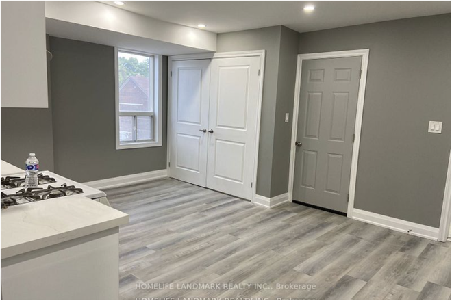 kitchen before it was furnished - Modern and Spacious Room in Top-Floor Annex Townhouse