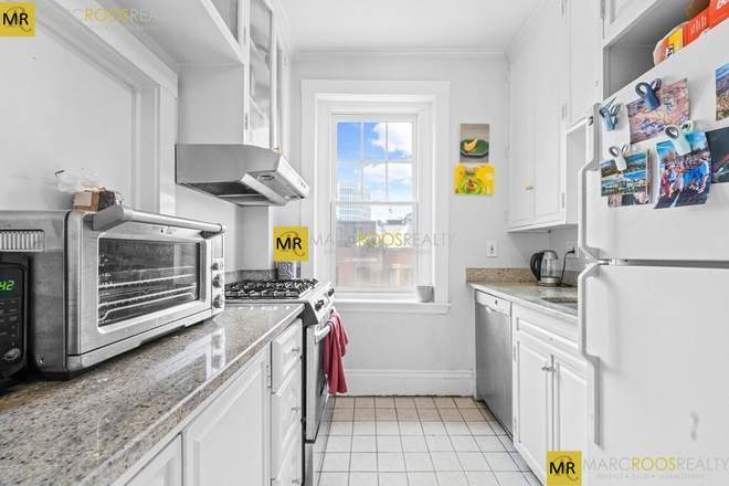 Call call or text Arezou at 617-584-7817 - Classy renovated 3 Bed unit on Boston's most fashionable street! H& HW included! Condo