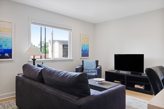 Living Room with tv stand, 40" smart tv - FULLY FURNISHED 1BR APT NEAR DUKE Bring Suitcase and Laptop — Everything else Is there for you!