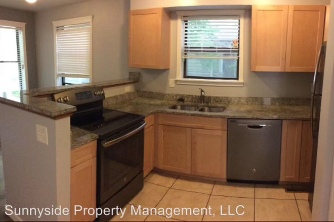 Kitchen - Sunnyside Property Management Apartments
