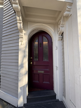 front door - Studio apartment with hot water included and in unit washer and dryer July 1