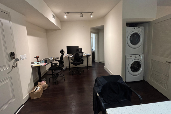 View of additional common area desk space/bike/scooter area (Laundry wash+dry) - Camden Boca Raton Apartments